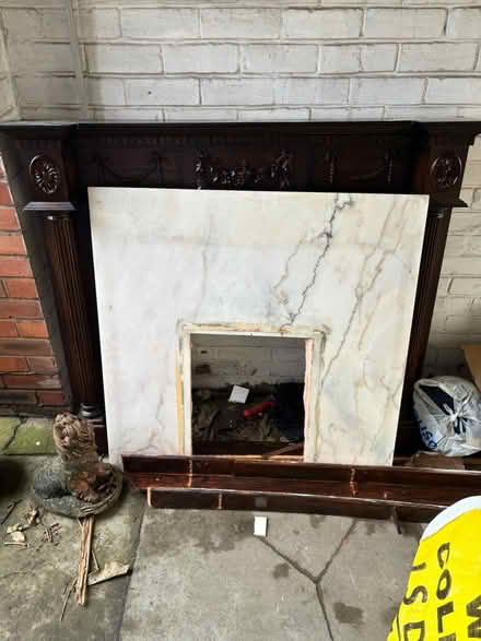 Photo of free Fire surround marble and wood (M41) #2