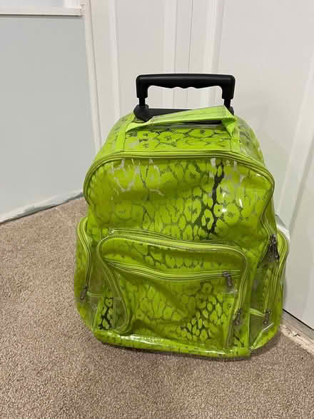 Photo of free Green plastic rolling backpack (Branford (near exit 54)) #1