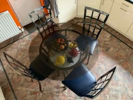 Photo of free Circular Glass table & four chairs (BN44) #1