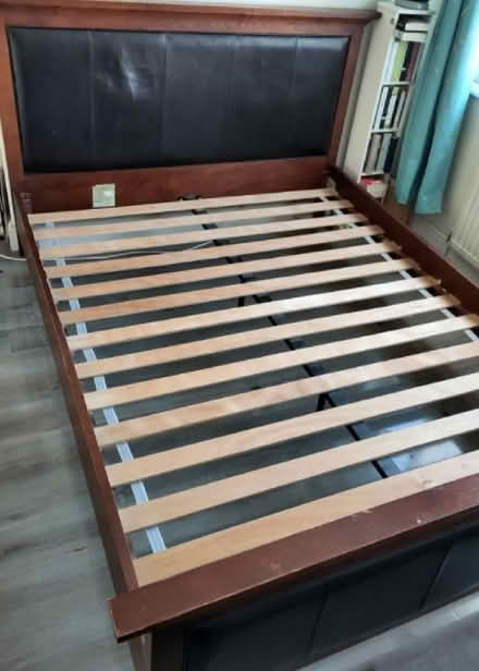Photo of free Kingsize solid bed frame (Huyton Quarry L36) #1