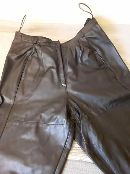 Photo of free woman's leather pants (near Britannia Plaza) #1