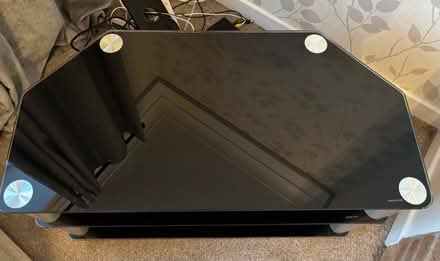 Photo of free Black glass TV unit (Wigston Magna) #3