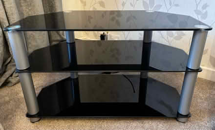 Photo of free Black glass TV unit (Wigston Magna) #2