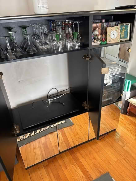 Photo of free Glass &mirror entertainment center (Eltingville . Staten Island) #1