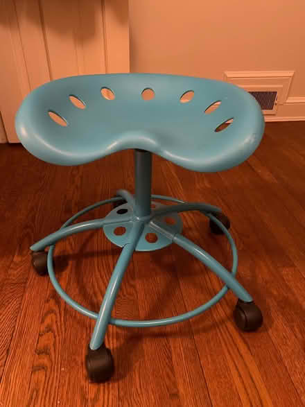 Photo of free Teal stool on wheels (Woodley Park, DC) #1