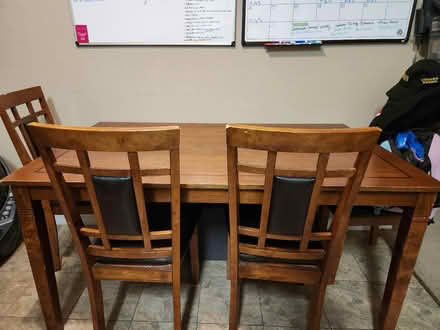 Photo of free Table and two Chairs (Historic Downtown Crestview) #1