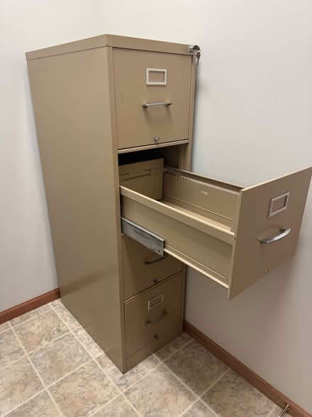 Photo of free 4-Draw Metal File Cabinet (Red Wing) #1