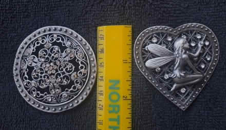 Photo of free 2 gray medallions? w/rhinestones (Southeast Wheaton) #1