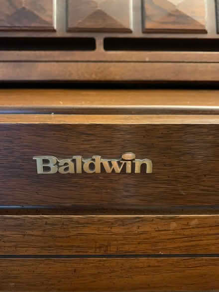 Photo of free Baldwin Piano with bench (South Downtown Orlando) #4