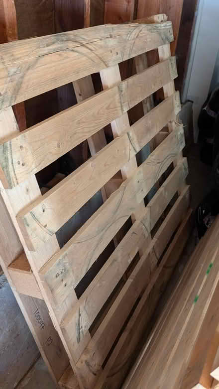 Photo of free 2 large wood pallets + 1 damaged (Miraloma) #1