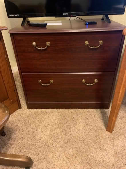 Photo of free Wood File cabinet (Orlando) #1