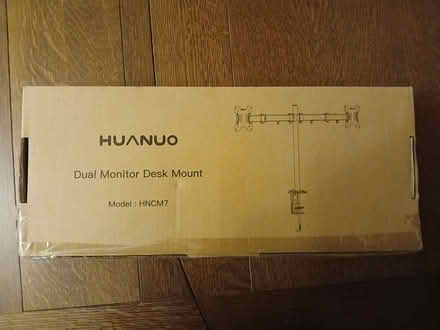 Photo of free Stand for attaching 2 computer monitors to a desk by Huanho (West Bridgford NG2) #1