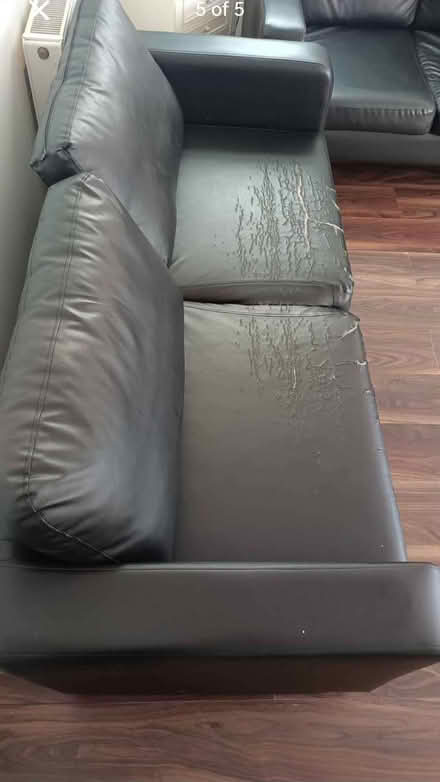 Photo of free Three seater black leather look sofa (Nitshill G53) #2