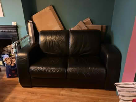 Photo of free Black leather sofa (Seaford BN25) #1