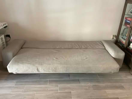 Photo of free Grey Futon (Ashburn Farm - Clearnight Ter) #2