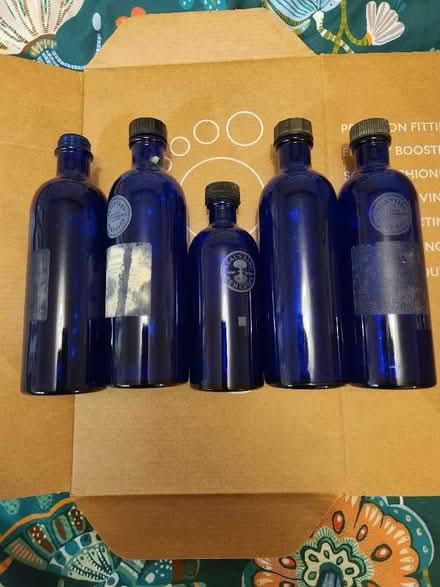 Photo of free Blue glass bottles (Noke OX3) #1