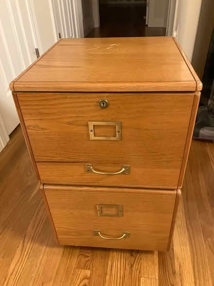 Photo of free Wood file cabinet (Carmel) #1