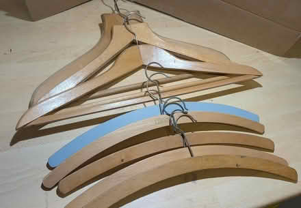 Photo of free 9x wooden coathangers (Stroud) #1