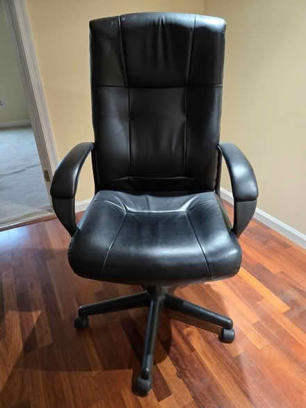 Photo of free Adjustable black leather desk chair (Off of Rt. 202, Branchburg) #1