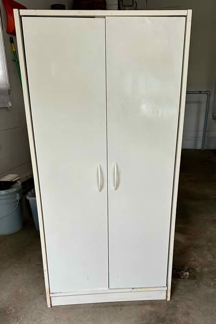 Photo of free 4 Shelf Storage Cabinet with Doors (Burien -North) #1