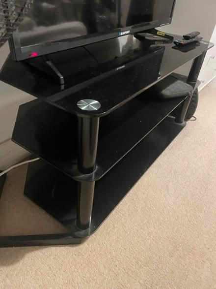 Photo of free Black glass Tv Unit (Staines) #1