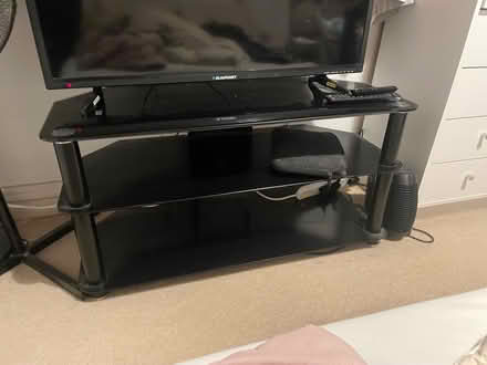 Photo of free Black glass Tv Unit (Staines) #2