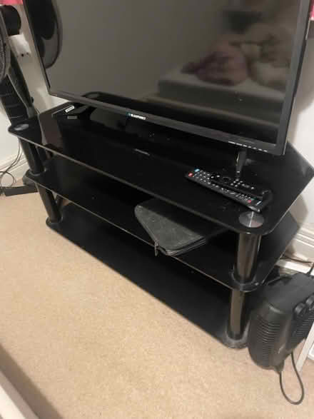 Photo of free Black glass Tv Unit (Staines) #3