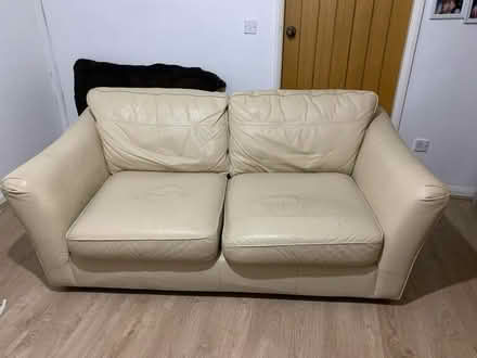 Photo of free 2 seater beige leather couch (Roby) #1