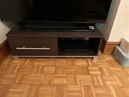 Photo of free TV unit - dark brown with silver trim (Matlock DE4) #1