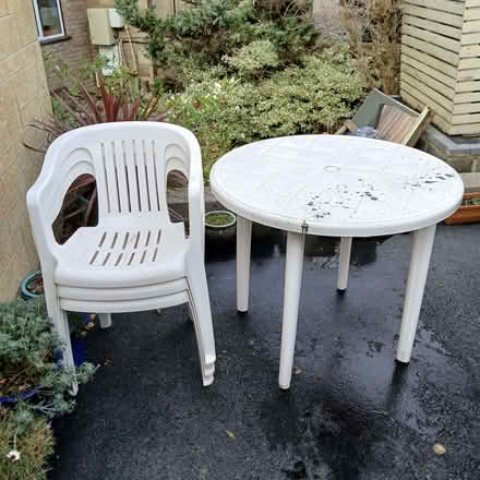 Photo of free Plastic table and 3 chairs (Stinchcombe GL11) #1