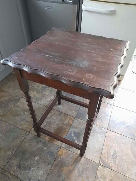 Photo of free Tall, dark wood table (GU12) #1