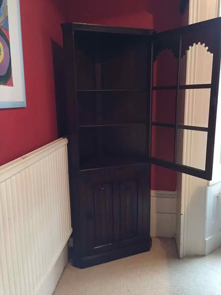 Photo of free Tall glass-fronted dark wood cabinet (Park Central B15) #4