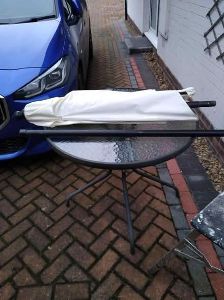 Photo of free Outdoor table with patio umbrella (YO24) #4