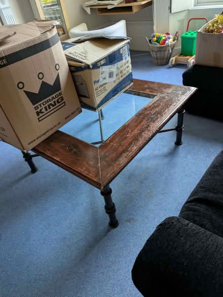 Photo of free Low glass topped square table (Park Central B15) #1