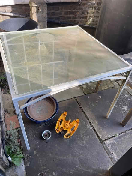 Photo of free Glass topped garden table (Barnes SW13) #1