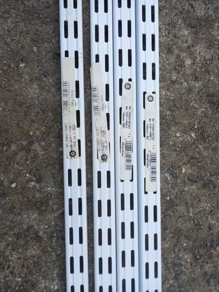 Photo of free 4 shelving uprights/ 12 shelf brackets (Craig-y-don LL30) #1