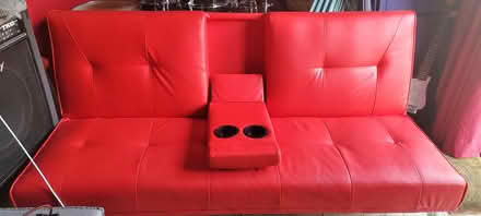 Photo of free Red click clack sofa (SN10 5TS Victoria park) #1