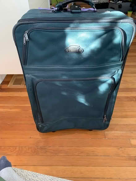 Photo of free Large green roller suitcase (Logan Circle) #1