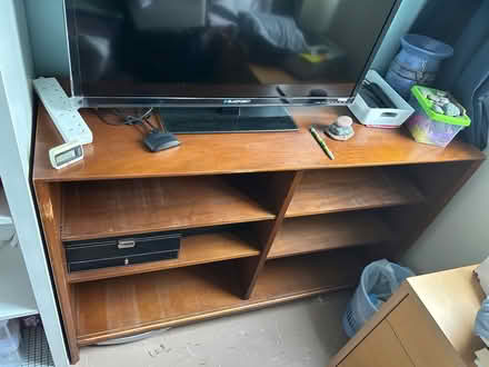 Photo of free Wood shelving unit (SG1) #1