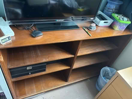 Photo of free Wood shelving unit (SG1) #3