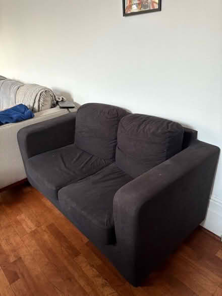 Photo of free Good condition black sofa (islington N1) #1