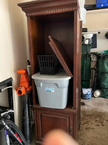 Photo of free 2 Tall brown wood shelves (Medical Center) #1