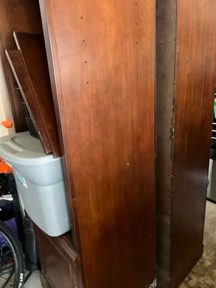 Photo of free 2 Tall brown wood shelves (Medical Center) #2