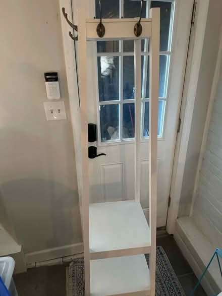 Photo of free Tall coat rack with shelves (Bloomingdale) #1