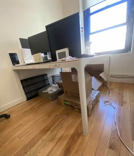 Photo of free Square wood table/ desk (W 27St and 6th Ave) #1