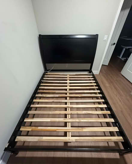 Photo of free Wood bed frame with headboard (North loop) #1