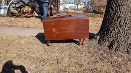 Photo of free Cherry wood laminate table (Abell St and Rose Ave E. STP) #1