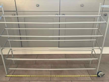 Photo of free Grey metal extending shoe rack (South Ockendon RM15) #2