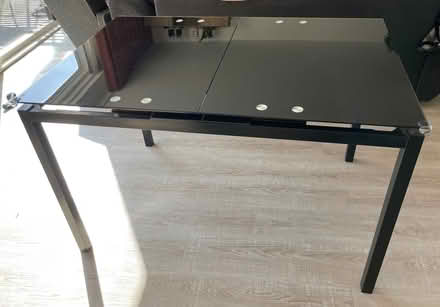 Photo of free Extendable black table (Mitcham's Corner CB4) #1