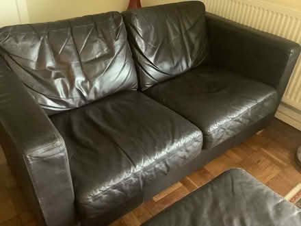 Photo of free Brown leather sofa + footstool (Tonedale) #1